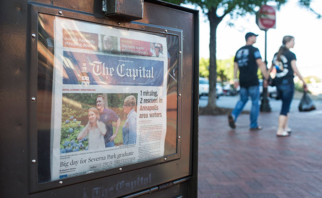 Amid Horror In Its Newsroom, Newspaper's Voice Rang Out