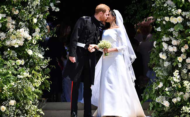 In A Star-Studded Wedding, Harry, Meghan Markle Shake Up Royal Tradition