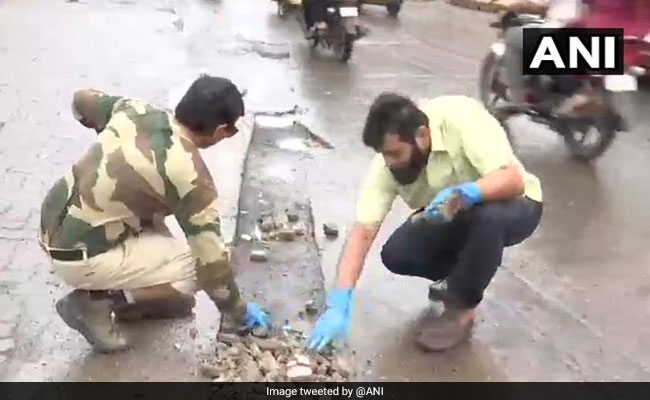 In Mumbai, A Citizens' Campaign To Fill Potholes On City Roads