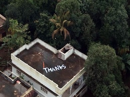 'Thanks' Painted On Rooftop Where Pregnant Woman Was Rescued By Navy 'Thanks' Painted On Rooftop Where Pregnant Woman Was Rescued By Navy