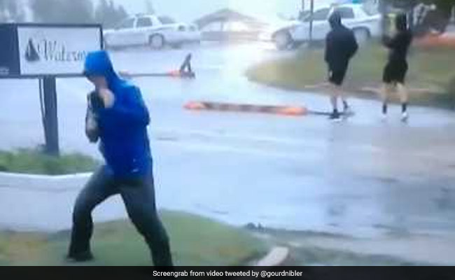 Hurricane Florence: Reporter Struggles To Stand As People Walk By Calmly In Viral Clip