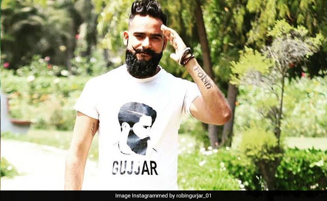 Bigg Boss 12: दादी के साथ धूम मचाने को तैयार रॉबिन गुर्जर, कुछ ऐसे जीते हैं देसी लाइफ.. देखें Pics