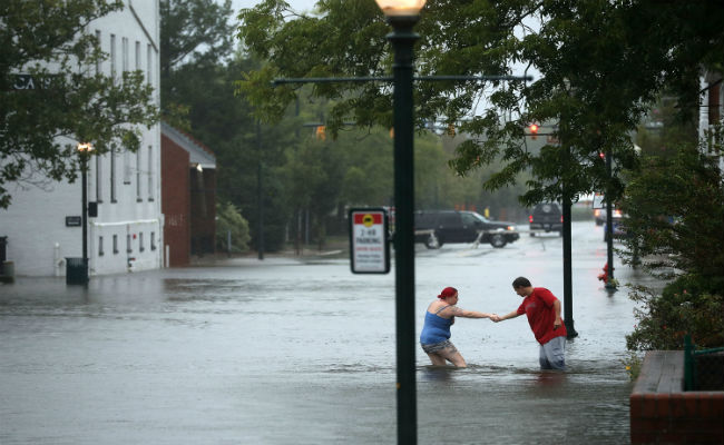 Florence "Unloading Epic Amounts Of Rainfall": North Carolina Governor