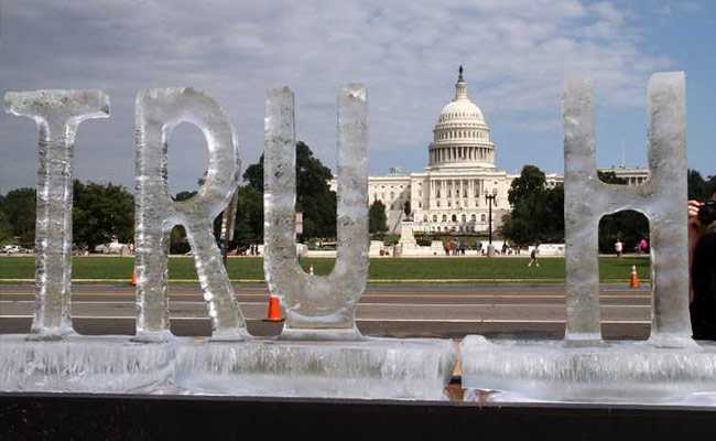 Melting "Truth" Ice Sculpture Protests "Fake News" At US Capitol Building