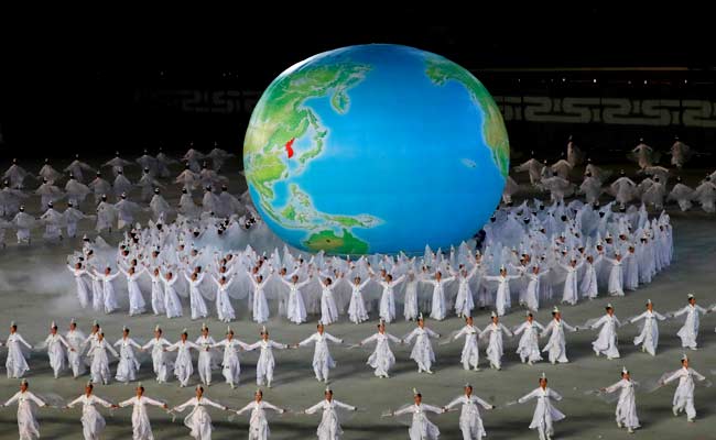 "Cuddled In Kim Jong Un's Arms": North Koreans Seek Unity Ahead Of Summit