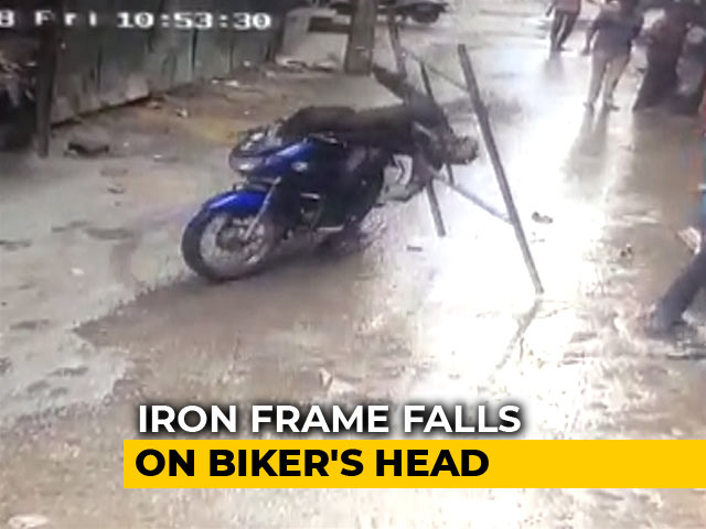 In Chilling CCTV Footage, Iron Frame Falls On Biker's Head In Bengaluru