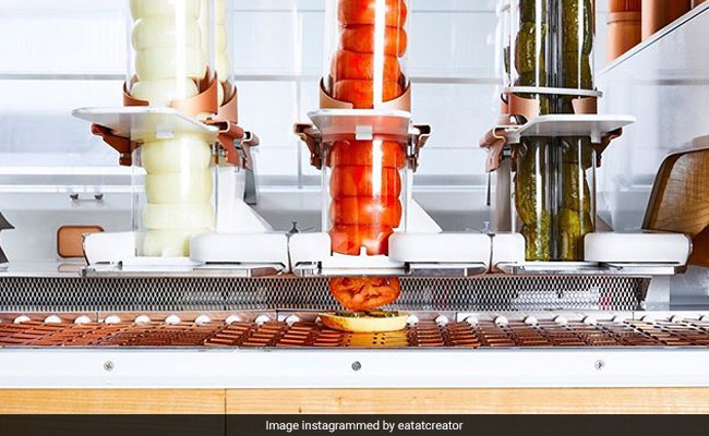 The Future Is Here: World's First Restaurant With Burger Making Robots Open For Walk-Ins