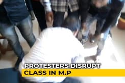 Professor Touches Feet Of Protesters Who Called Him 'Anti-National' Professor Touches Feet Of Protesters Who Called Him 'Anti-National'