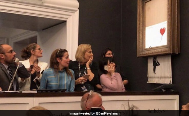 Banksy Artwork Shreds Itself Moments After Record Sale At Auction