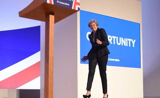 Watch Theresa May Channel "Dancing Queen" Ahead Of Speech At Party Meet