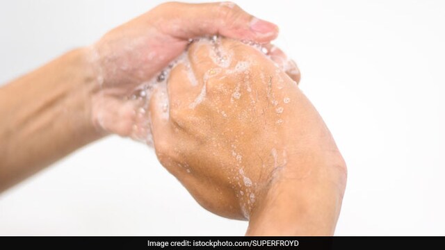 Thirty-one people were filmed washing their hands with soap at a basin.
