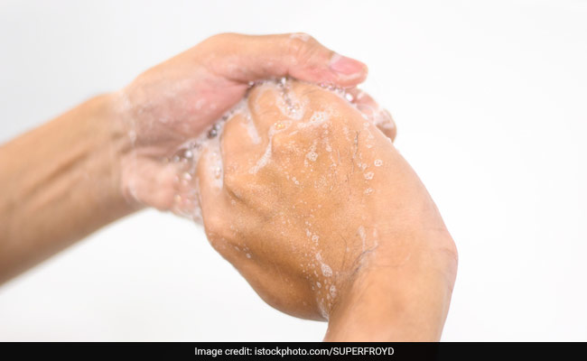 Thirty-one people were filmed washing their hands with soap at a basin.