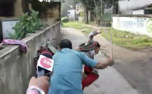 Caught On Camera: Trinamool Leaders Attack Woman BJP Supporter Twice