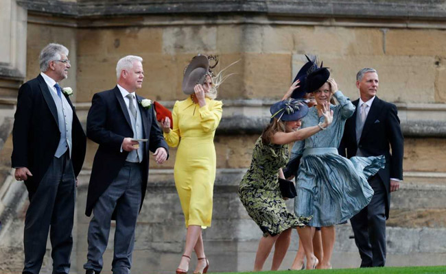 Holding Their Hats, Guests Arrive For 2018's Second Big UK Royal Wedding