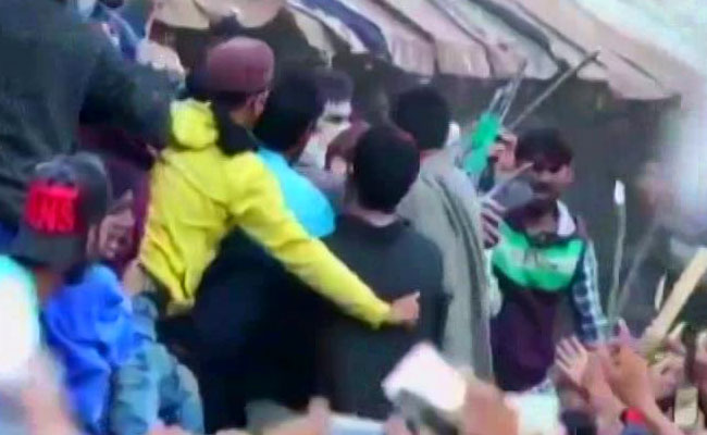 Video Shows Gun-Waving Terrorists Lead Crowds At Funeral In Kashmir