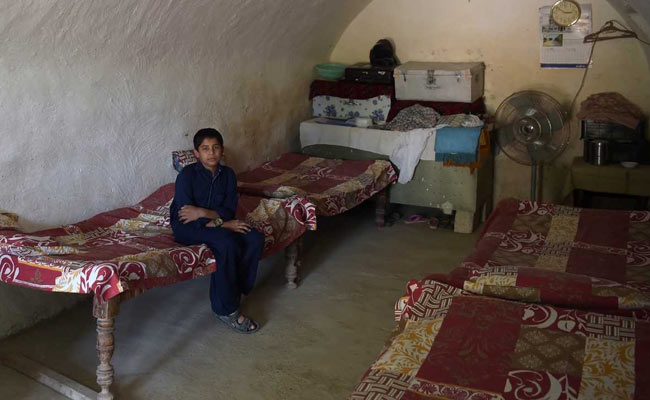 In A Pakistani Village, Home Is Where The Cave Is
