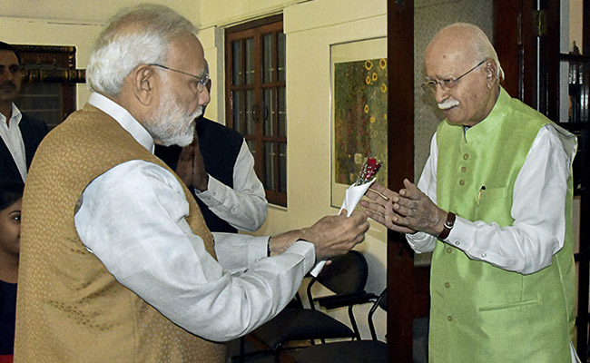 PM Modi Visits LK Advani To Wish Him Birthday, Gifts Him Flower