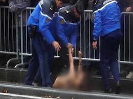 Topless Female Protester Runs At Trump's Motorcade In Paris Topless Female Protester Runs At Trump's Motorcade In Paris