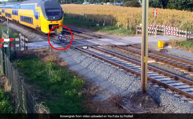 Cyclist Did Not See Oncoming Train. Watch What Happened Next...