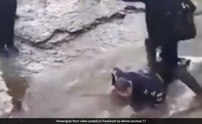 Boy With Cerebral Palsy Made To Lie In Muddy Creek, Used As Human Bridge
