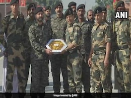 BSF, Pakistan Rangers Exchange Sweets At Attari-Wagah Border On Diwali BSF, Pakistan Rangers Exchange Sweets At Attari-Wagah Border On Diwali