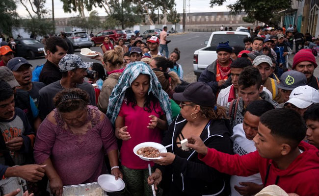 Migrant Caravan Arrives At US-Mexico Border