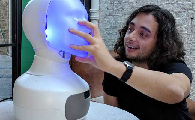 Robot With 'Human-Like Face' Smiles, Encourages People To Interact