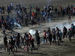 Scenes Of Children Choking On Tear Gas As US Migrant Crisis Escalates Scenes Of Children Choking On Tear Gas As US Migrant Crisis Escalates