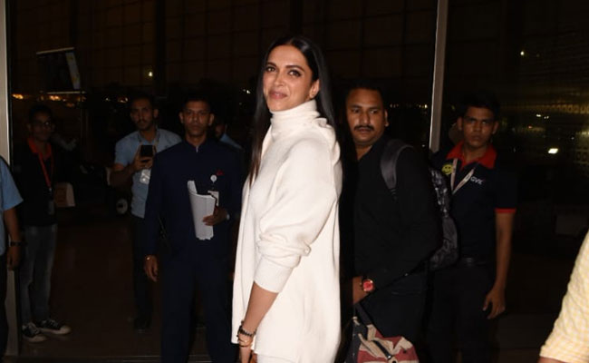 Deepika Padukone And Ranveer Singh Left For Their Wedding Wearing White. Get Deepika's Look
