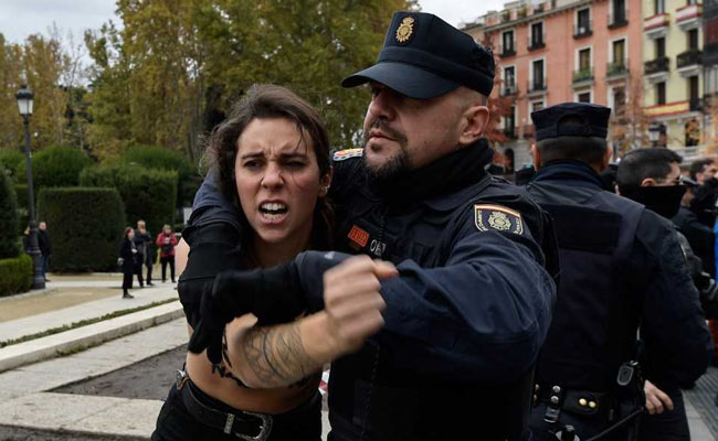 Topless Femen Activists Disrupt Rally Of Former Dictator's Fans In Madrid