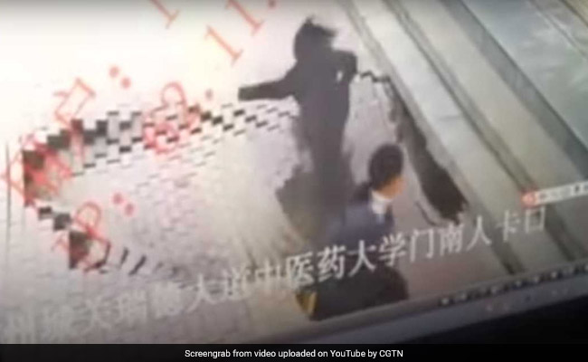 Shocking Video Shows Woman Disappearing Into Sinkhole As Sidewalk Collapses