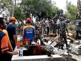 Hunt For Tsunami Survivors As Indonesian Rescuers Battle Heavy Rain Hunt For Tsunami Survivors As Indonesian Rescuers Battle Heavy Rain