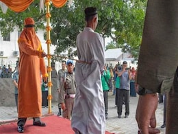 Indonesia's Aceh Whips Men For Sharia-Banned Gambling Indonesia's Aceh Whips Men For Sharia-Banned Gambling