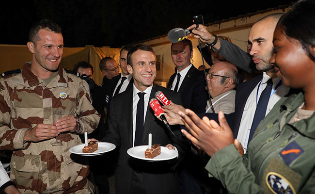 Emmanuel Macron Takes Champagne And Foie Gras To French Soldiers In Chad