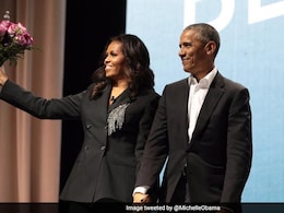 Obamas In Talks To Produce Tiger Woods Film Obamas In Talks To Produce Tiger Woods Film