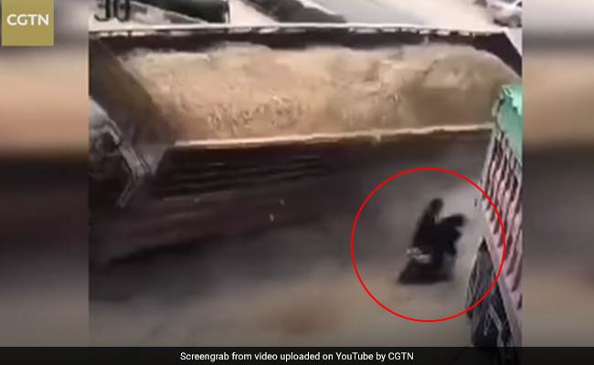 Watch: Very Narrow Escape For 2 Men As Truck Crashes Over Them