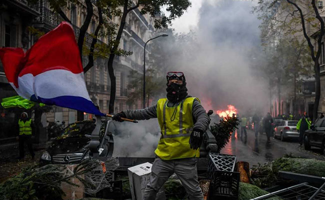To End "Yellow Vest" Protests, France To Suspend Fuel Tax Hikes: Report