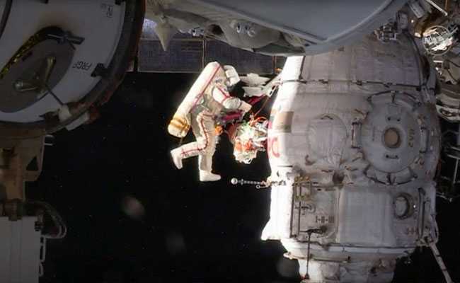 Russian Spacewalkers Inspect Mystery Hole At International Space Station