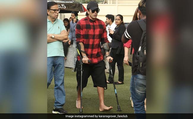 बिपाशा बसु के पति करण सिंह ग्रोवर बैसाखी पर चलने पर हुए मजबूर, ये रही वजह... देखें Pics