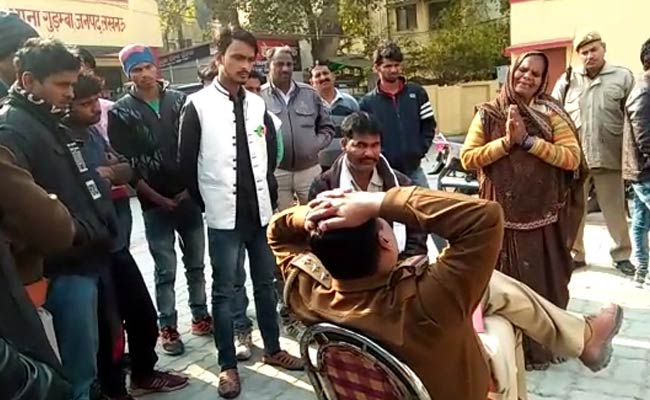 UP Cop Shifted Out After Video Shows Elderly Woman Pleading At His Feet
