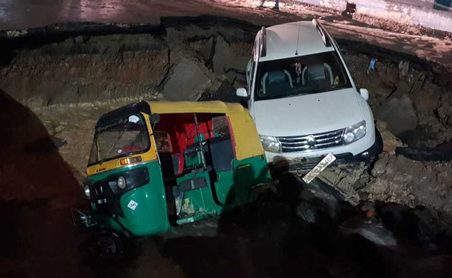 Delhi Road Under Metro Station Caves In, Takes Down Car, Auto