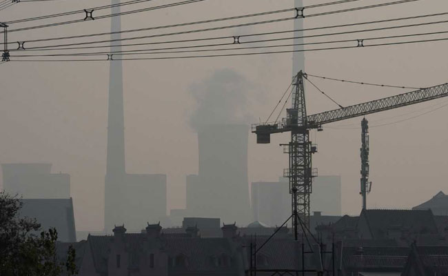 Chinese Cities Issue "Orange" Smog Alert, State Radio