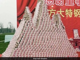 Chinese Company Builds $44 Million 'Cash Mountain' To Show Off Year-End Bonuses Chinese Company Builds $44 Million 'Cash Mountain' To Show Off Year-End Bonuses