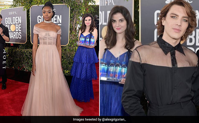 'Fiji Water Girl' Photobombed Every Golden Globes Red Carpet Pic And Twitter Loves It
