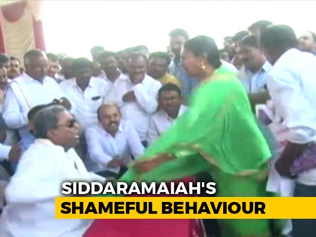 Siddaramaiah Caught On Camera Snatching Mic From Woman In Fit Of Rage