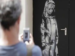 Mural By UK's Elusive Street Artist Disappears From Paris Theatre Mural By UK's Elusive Street Artist Disappears From Paris Theatre