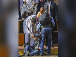 Watch: Rahul Gandhi Helps Photographer Who Fell At Airport. Twitter In A Flap Watch: Rahul Gandhi Helps Photographer Who Fell At Airport. Twitter In A Flap