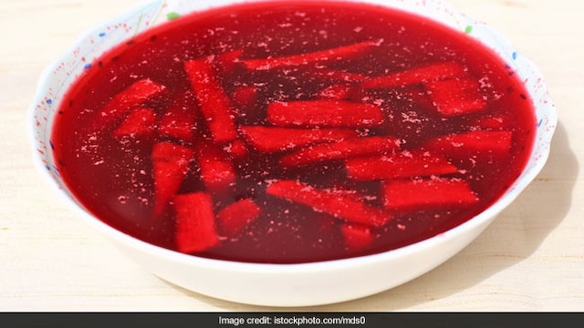 Kaanji is a traditional healthy drink is made with black carrots and some Indian spices.