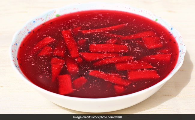 Kaanji is a traditional healthy drink is made with black carrots and some Indian spices.