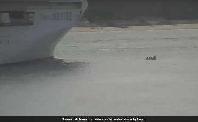 Watch: 1,000-Foot Cruise Liner Misses Tiny Dinghy Drifting Helplessly